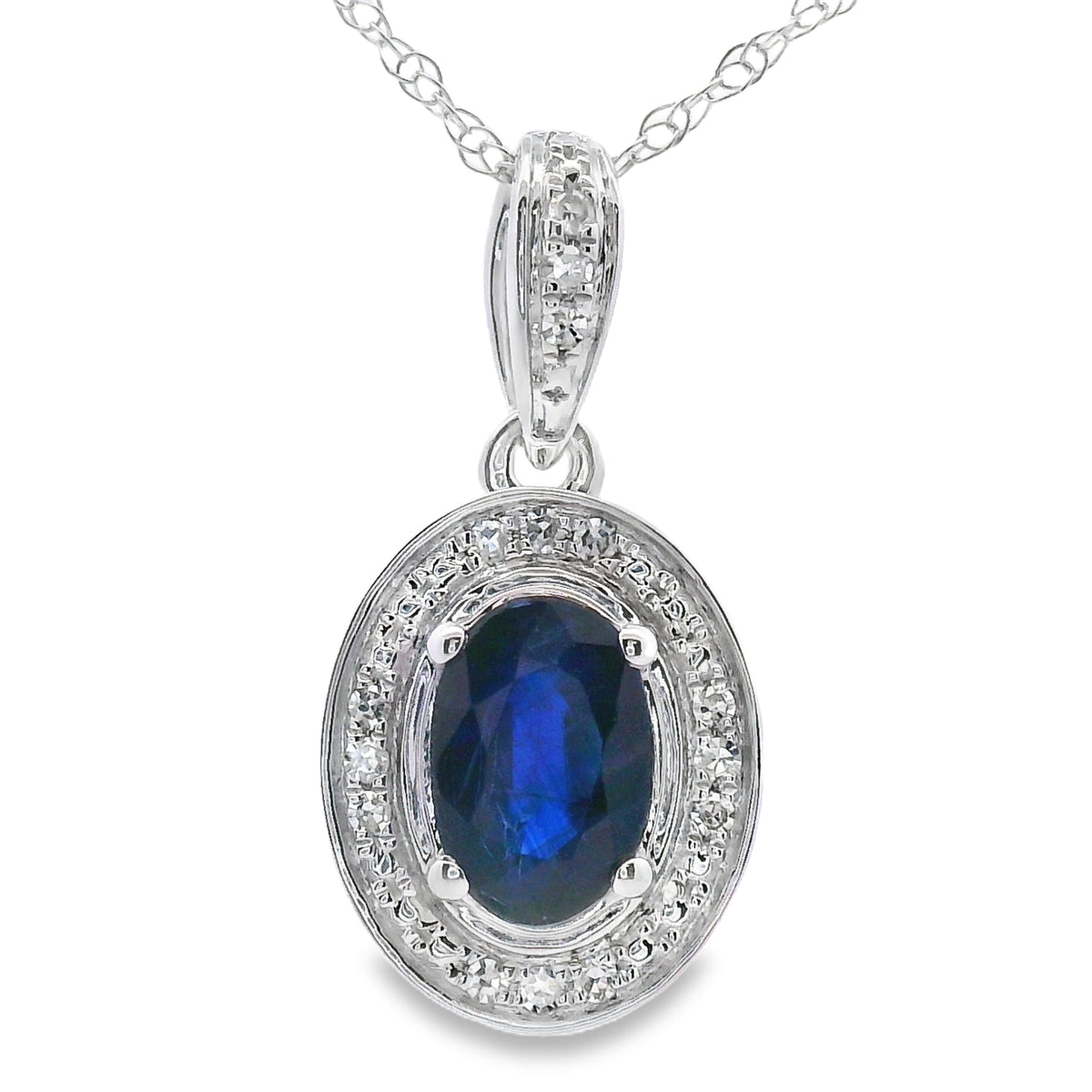 Colgantes de moda de zafiro y diamantes de .65 ct en oro blanco de 10 qt