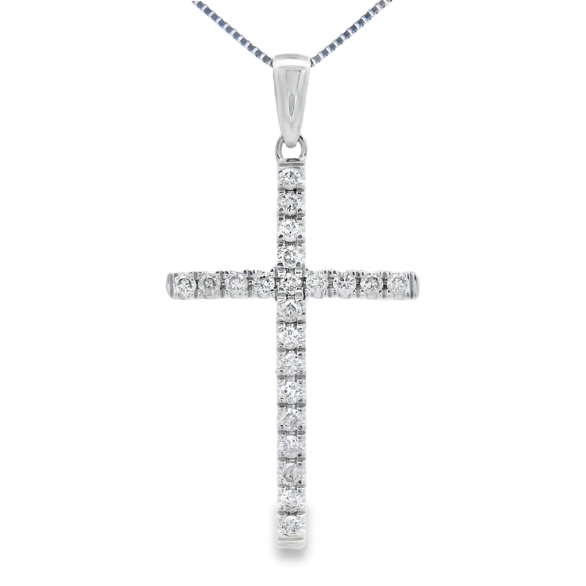 Colgante de cruz religiosa con diamantes de 0,21 ct en oro blanco de 14 kt