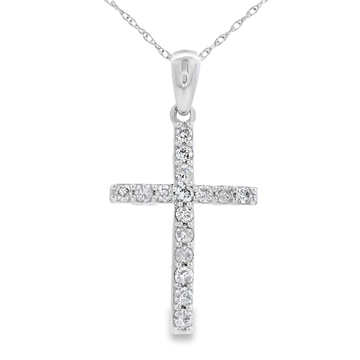 Colgante religioso de cruz con diamante de 0,30 qt en oro blanco de 14 kt