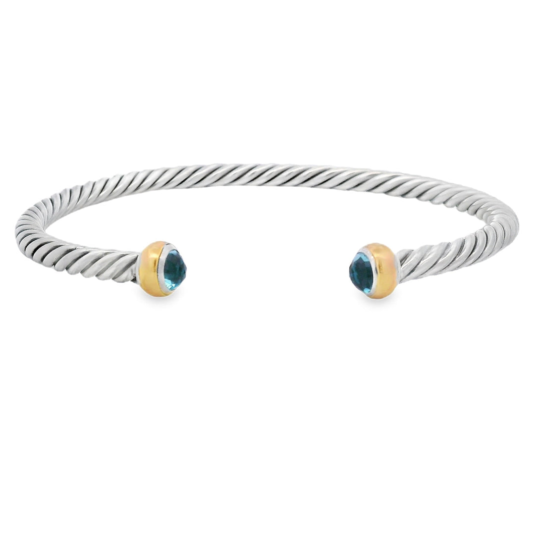 Pulsera de plata de ley de topacio azul con oro de 18 quilates