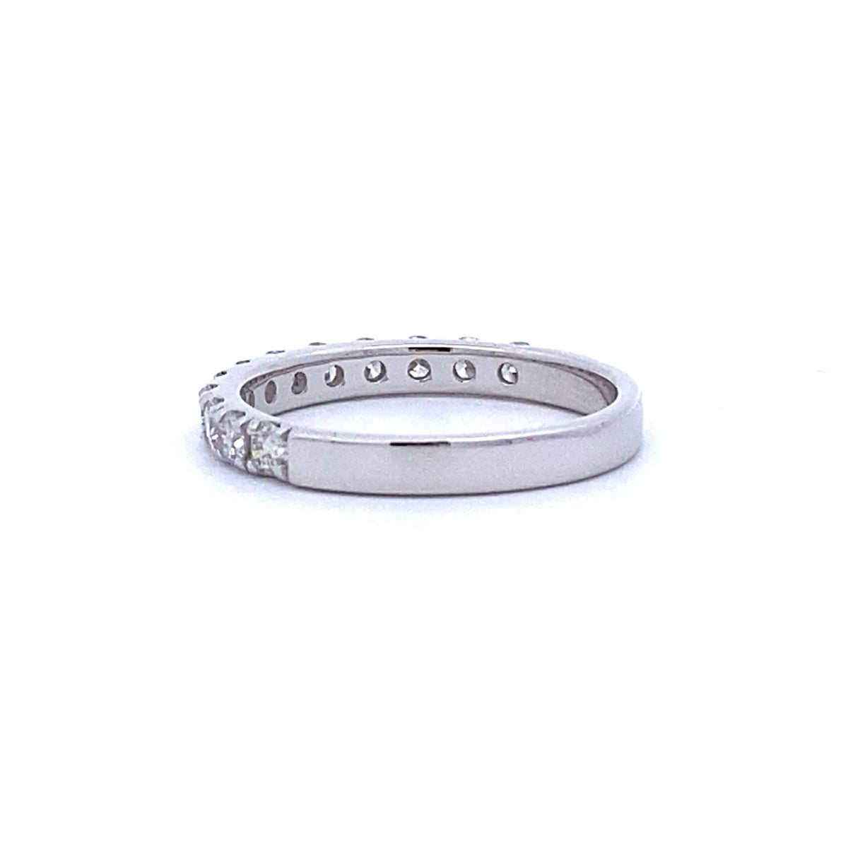 Anillo de boda con diamante natural de .75ct en oro blanco de 14kt