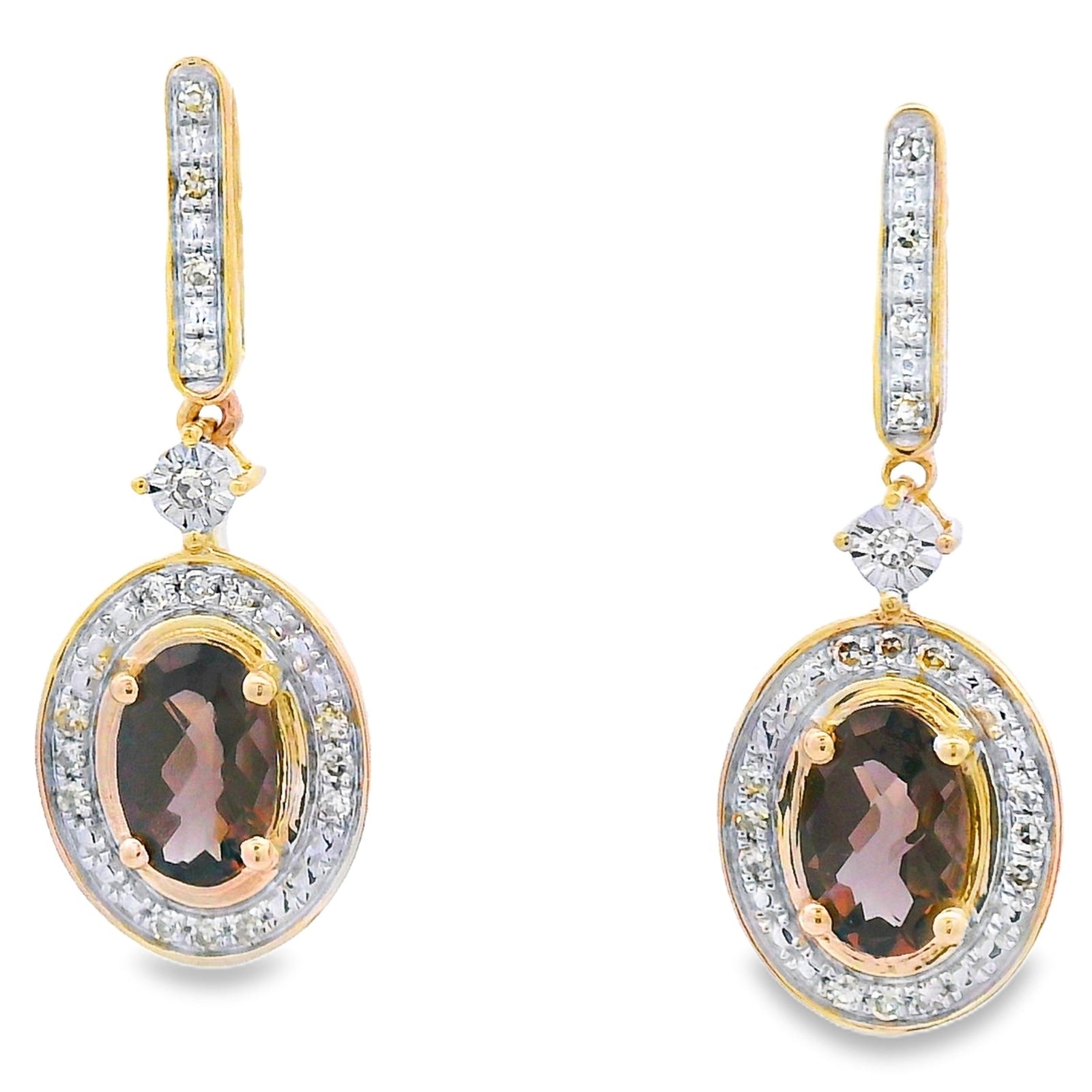 Pendientes colgantes de cuarzo y diamantes de .88 ct, oro amarillo de 10 qt