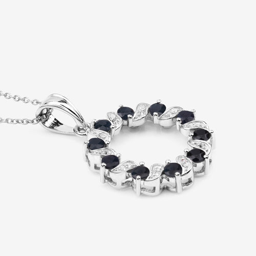 Colgante de plata de ley .925 con zafiro azul genuino de 1.30 quilates y topacio blanco
