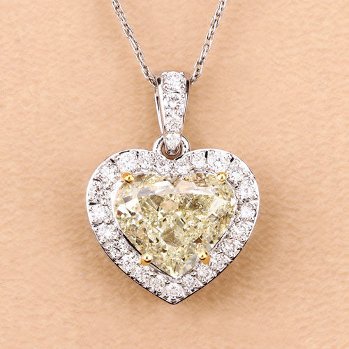 Colgante de oro blanco de 18K con diamante amarillo claro natural de 4.51 quilates certificado por el IGI y diamantes blancos de 0.45cttw (4.96cttw)