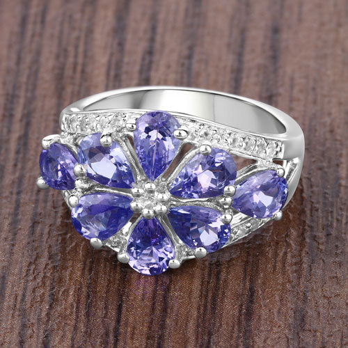 Anillo de plata de ley .925 con tanzanita genuina de 3.24 quilates y topacio blanco