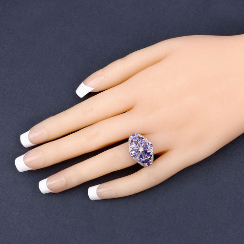 Anillo de plata de ley .925 con tanzanita genuina de 3.24 quilates y topacio blanco
