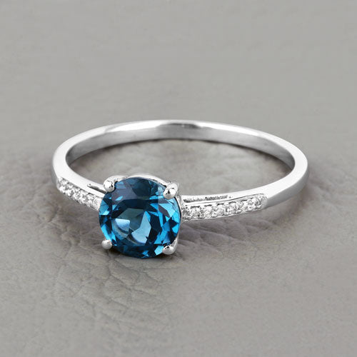 Anillo de oro blanco de 14 quilates con topacio azul de Londres genuino de 1,05 quilates y diamantes blancos