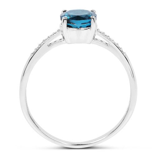 Anillo de oro blanco de 14 quilates con topacio azul de Londres genuino de 1,05 quilates y diamantes blancos