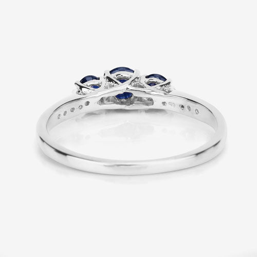 Anillo de oro blanco de 14K con zafiro azul genuino de 0,56 quilates y diamantes blancos