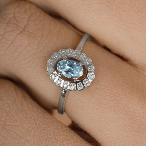 Anillo de oro blanco de 14 quilates con aguamarina auténtica de 0,44 quilates y diamantes blancos