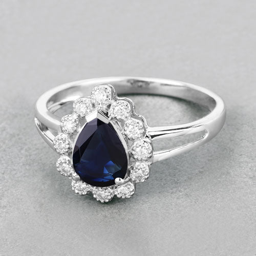 Anillo de oro blanco de 10 quilates con zafiro azul genuino de 1,46 quilates y diamantes blancos