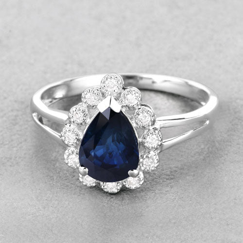 Anillo de oro blanco de 14K con zafiro azul genuino de 1.46 quilates y diamantes blancos