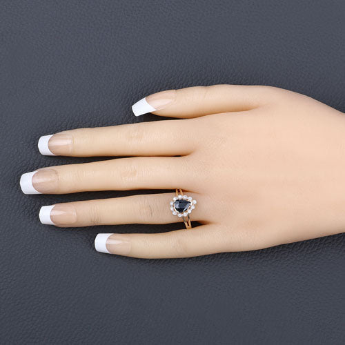 Anillo de oro amarillo de 10 quilates con zafiro azul genuino de 1.46 quilates y diamantes blancos