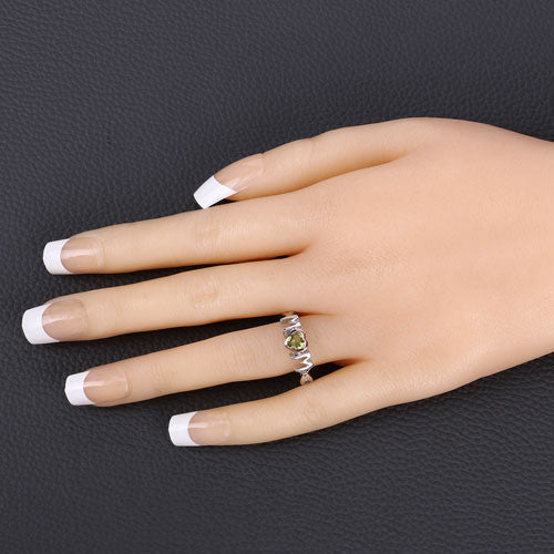 Anillo de plata de ley .925 con peridoto genuino de 0.44 quilates