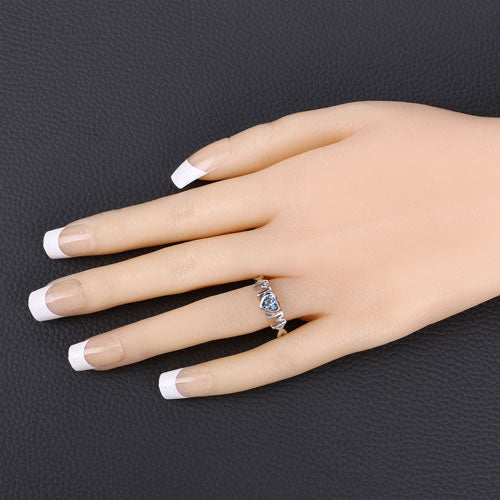 Anillo de plata de ley .925 con topacio azul suizo auténtico de 0,52 quilates
