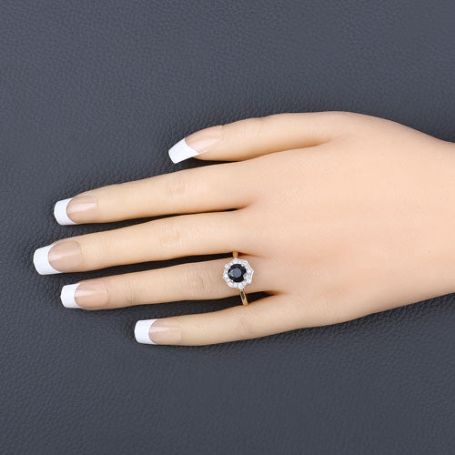 Anillo de oro amarillo de 10K con zafiro azul genuino de 1.34 quilates y diamante blanco