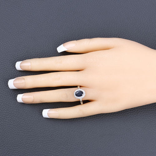 Anillo de oro blanco de 14K con zafiro azul genuino de 1.84 quilates y diamantes blancos