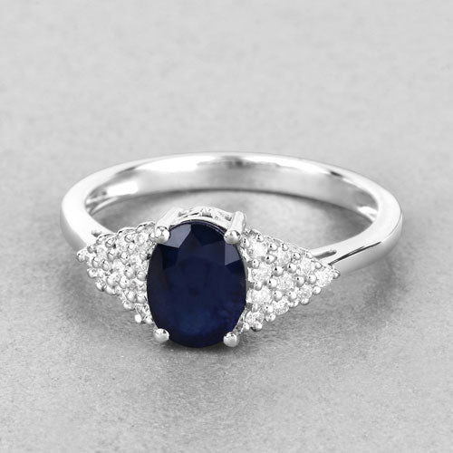 Anillo de zafiro azul genuino de 1.73 quilates y diamantes blancos en oro blanco de 14 quilates