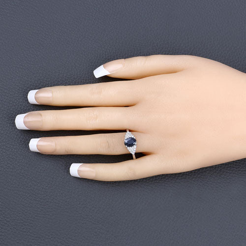 Anillo de zafiro azul genuino de 1.73 quilates y diamantes blancos en oro blanco de 14 quilates