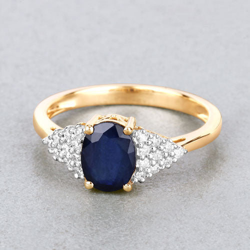 Anillo de oro amarillo de 14K con zafiro azul genuino de 1.73 quilates y diamantes blancos