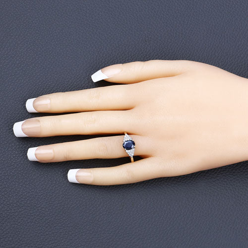 Anillo de oro amarillo de 14K con zafiro azul genuino de 1.73 quilates y diamantes blancos