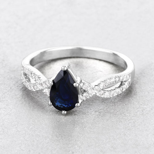 Anillo de oro blanco de 14K con zafiro azul genuino de 1,14 quilates y diamantes blancos