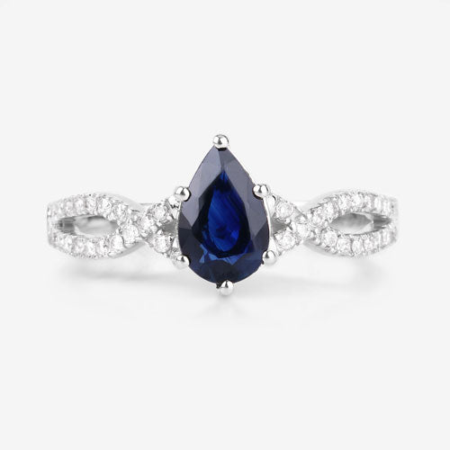 Anillo de oro blanco de 14K con zafiro azul genuino de 1,14 quilates y diamantes blancos