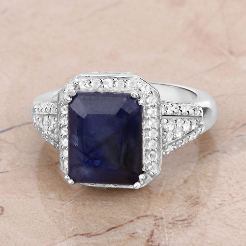 Anillo de plata de ley .925 con zafiro relleno de vidrio de 4.80 quilates y topacio blanco