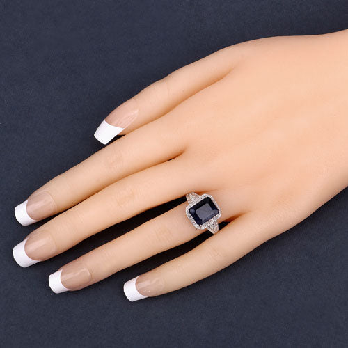 Anillo de plata de ley .925 con zafiro relleno de vidrio de 4.80 quilates y topacio blanco