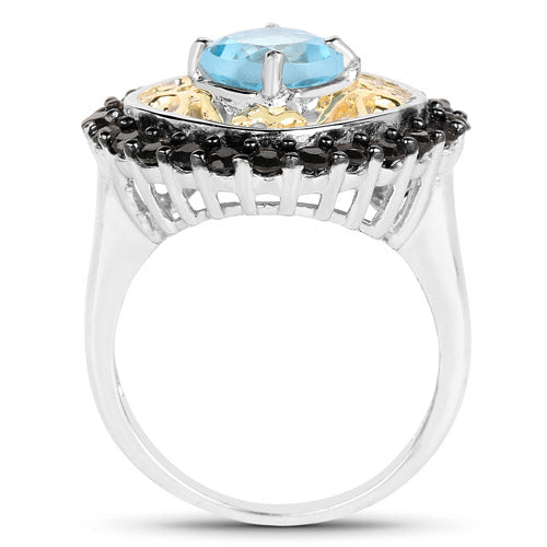 Anillo de plata esterlina .925 chapado en dos tonos con topacio azul suizo auténtico de 2.85 quilates y espinela negra