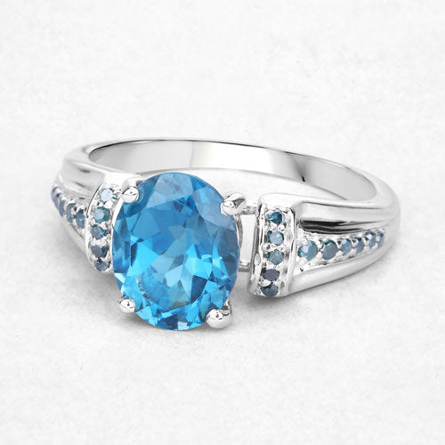 Anillo de plata esterlina .925 con topacio azul de Londres genuino de 2,72 quilates y diamantes azules