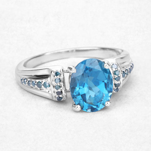 Anillo de plata esterlina .925 con topacio azul de Londres genuino de 2,72 quilates y diamantes azules