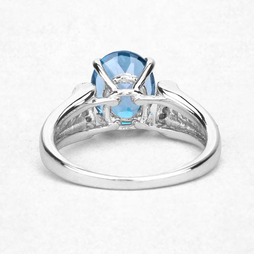 Anillo de plata esterlina .925 con topacio azul de Londres genuino de 2,72 quilates y diamantes azules