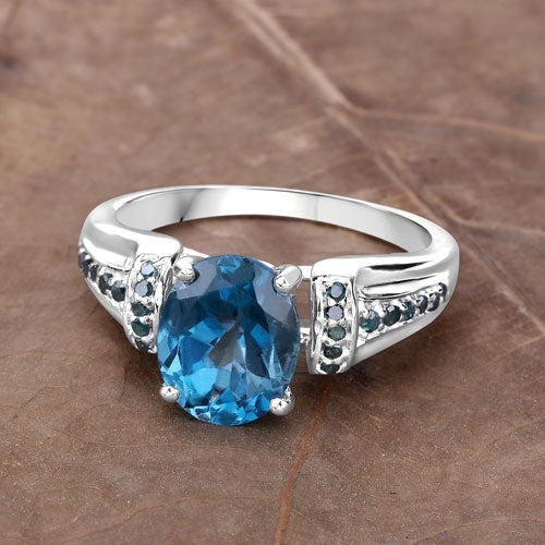 Anillo de plata esterlina .925 con topacio azul de Londres genuino de 2,72 quilates y diamantes azules