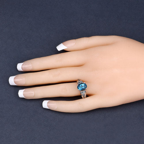 Anillo de plata esterlina .925 con topacio azul de Londres genuino de 2,72 quilates y diamantes azules